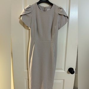 Size 4 scuba sheath by Calvin Klein. Only worn once. EUC.